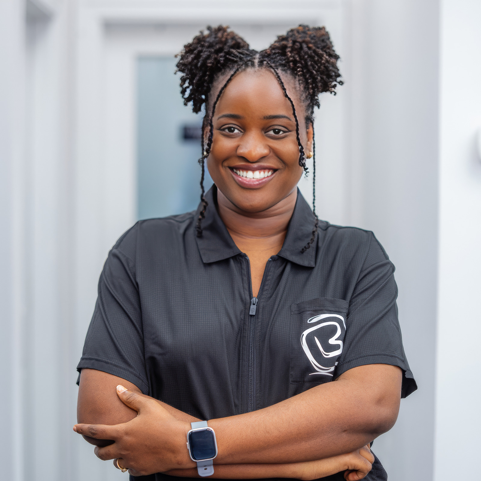 Koddie Madu — braiding and styling specialist at BigHouse Barber Studio in Milton, Ontario